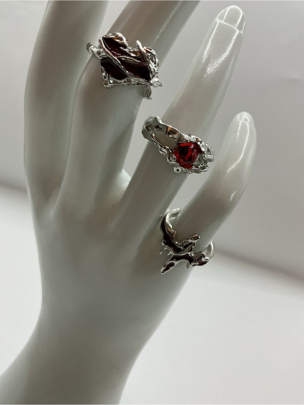 3 SILVER TONE DAINTY RINGS WITH RED ACCENTS ADJUSTABLE